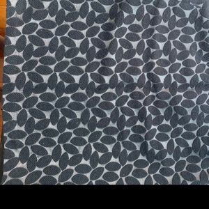 Knee length black on black skirt